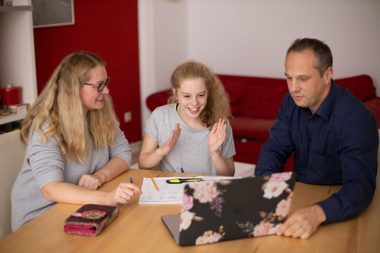 Parents helping the student with distance learning