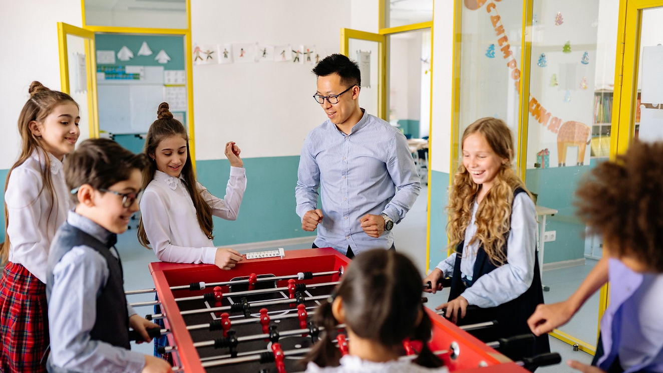 Teaching kids with a foodsball game